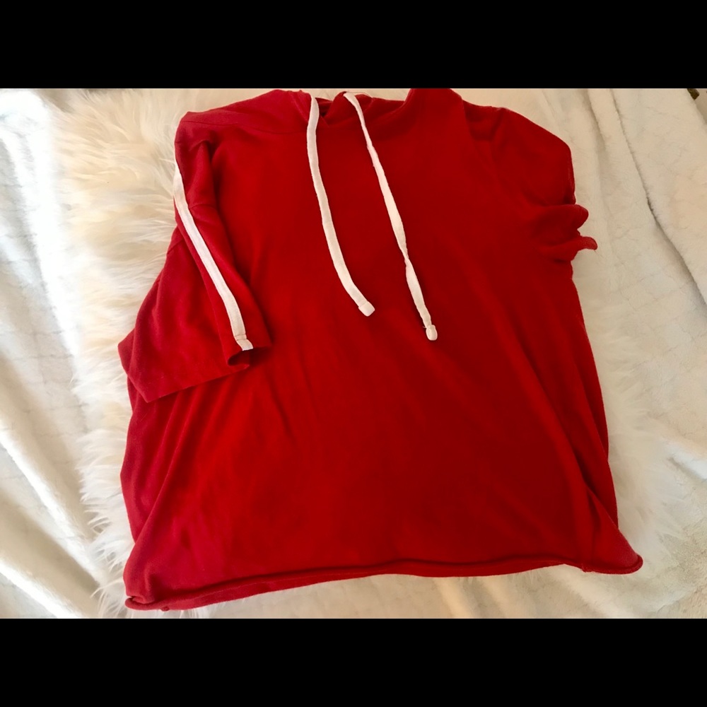 shirt with one stripe on the sides of the sleeve